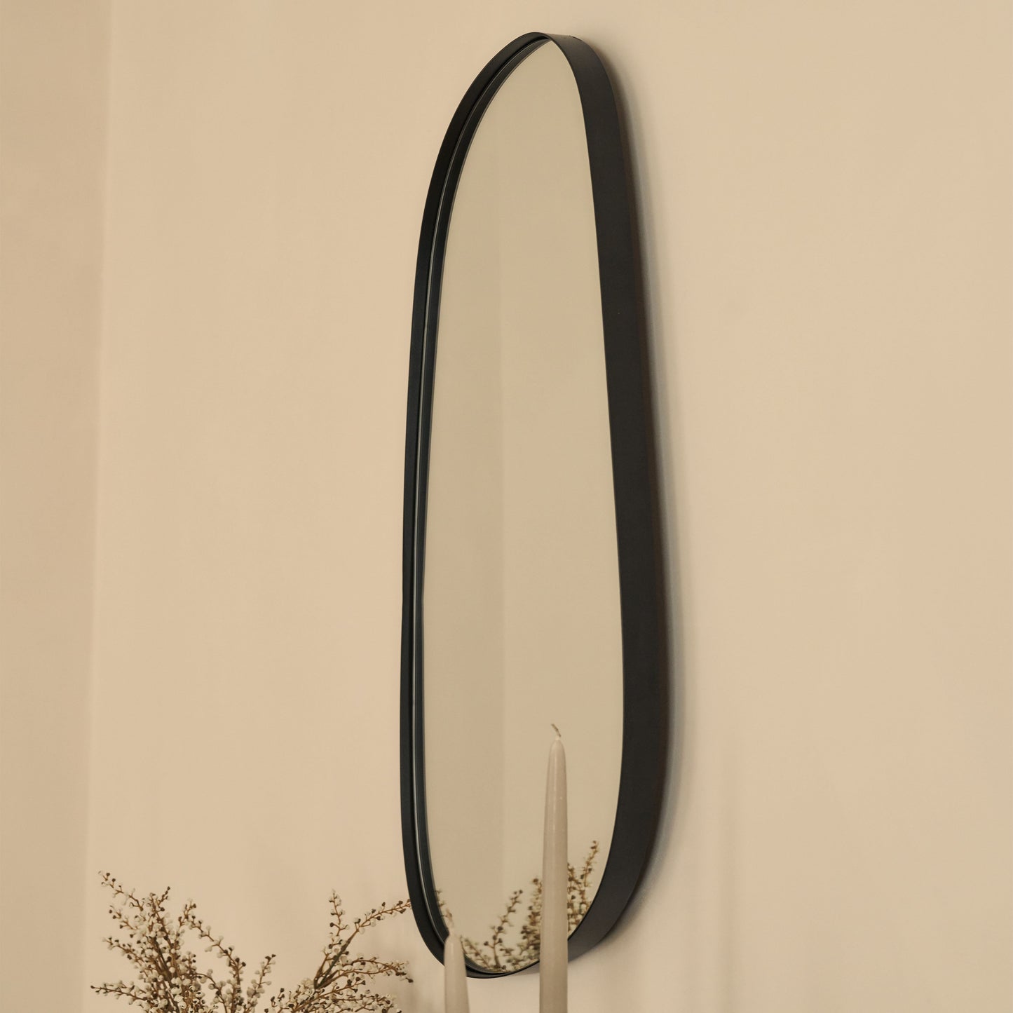 Ava - Miroir irrégulier en forme de pierre noire 75 cm x 45 cm